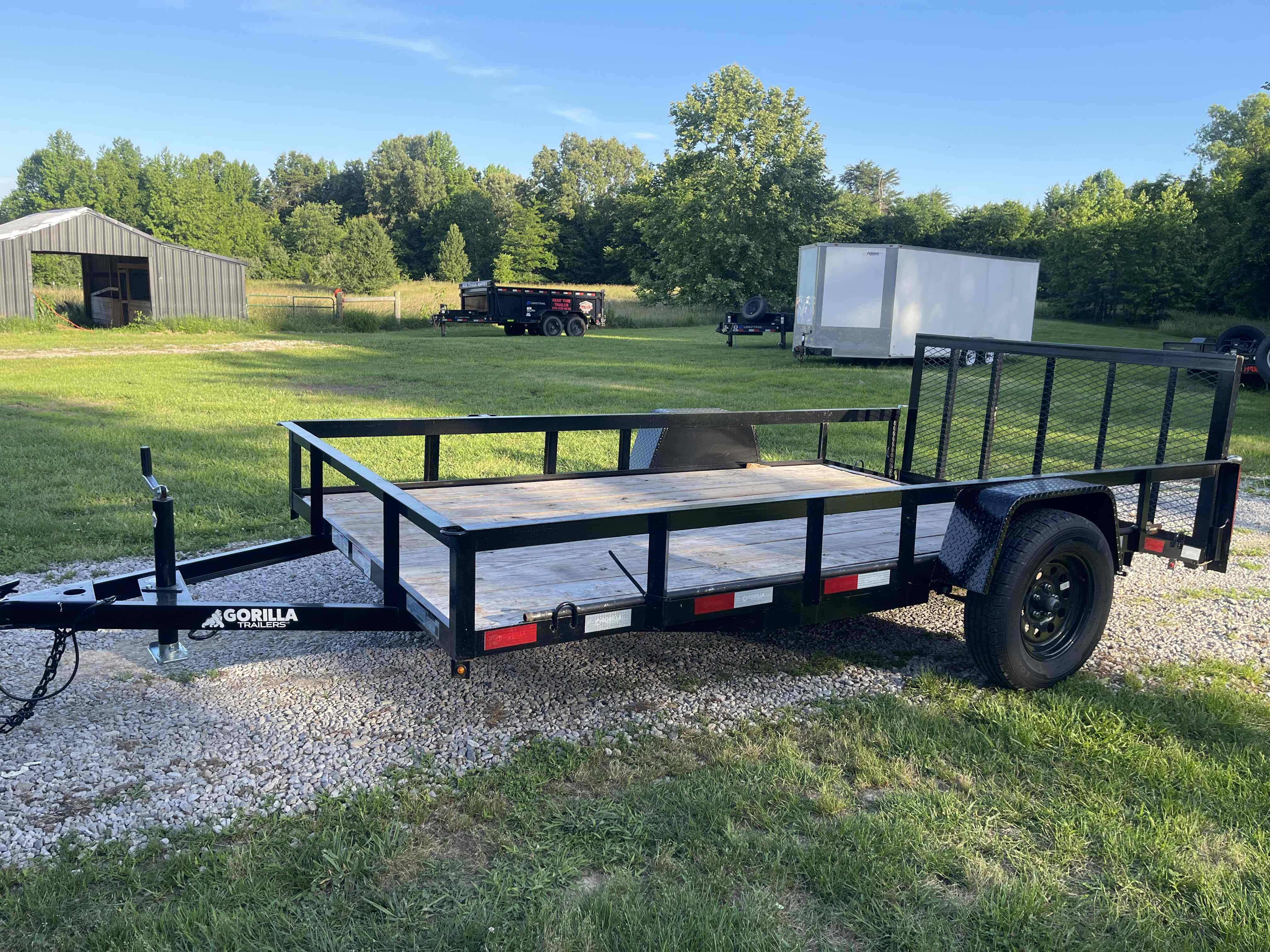 6.4-foot by 12-foot Gorilla utility trailer for rent in Hopkins County, Kentucky - perfect for small moves and yard cleanup